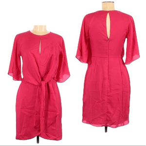 Adelyn Rae S pink flutter sleeves keyhole neck
& back tied waist mock wrap dress